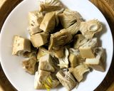 A picture of step 1 of Echorer Muri Ghonto (Green Jackfruit Cooked with Basmati Rice - Bong Style).