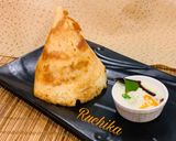 A picture of step 6 of Ghee Roast Podi Dosa.