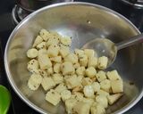 A picture of step 2 of Veg. Babycorn in curd.