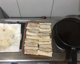 A picture of step 7 of Cheat Day Crispy pork spring rolls.