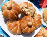 A picture of step 14 of Pumpkin shaped dinner rolls.