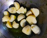 A picture of step 4 of Aloo palak.
