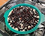 A picture of step 9 of Black Currant Mascarpone Cake with Cherry Sugar.