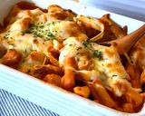 A picture of step 9 of Sausage pasta bake in tomato cream sauce.