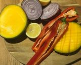 A picture of step 1 of Spicy Mango Salsa.
