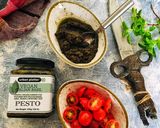 A picture of step 1 of Basil pesto spaghetti with loads of cherry tomatoes.