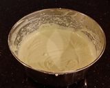 A picture of step 9 of White Chocolate Cherry Truffle Cheesecake.