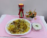 A picture of step 6 of Chicken biryani masala.