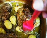 A picture of step 8 of Pork Chops with Honey, Soy Sauce, Mustard, and Lemon Baby Potatoes in a Dutch Oven.