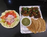 A picture of step 3 of Mutton kababs and parathas with curd chattny and salad.