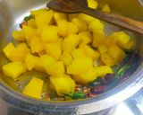 A picture of step 4 of Kappa Puzhukku (Tapioca).