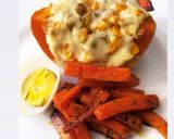 Foto del paso 4 de la receta: Calabacín relleno vegetariano con zanahorias salteadas