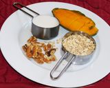 A picture of step 1 of Oats & Walnut Pancakes with Mango-Cashew Cream.