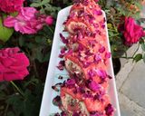 A picture of step 4 of Rose and Coconut Flavor Swiss Roll with mava and Gulkand Filling.