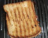 A picture of step 8 of Three layered cheese grilled sandwich.