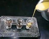 A picture of step 6 of Mango milkshake shots with chocolate syrup.