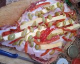 Foto del paso 2 de la receta: Pulpón relleno de jamón, panceta, queso, morrón, y aceitunas