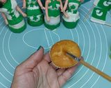 A picture of step 2 of Ready-made cupcakes with Fondant topper independence day theme.