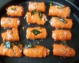 A picture of step 21 of Cheesy Beetroot khandvi roll.