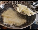 A picture of step 3 of Peri Peri French fries.