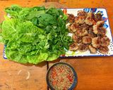 A picture of step 6 of Meatballs with nouc cham, cucumber and mint.