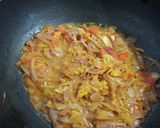 A picture of step 6 of Muri ghonto/Bengali fish head with rice.