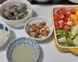 A picture of step 1 of Mango, Fruits and Shrimp Salad with Nuts.