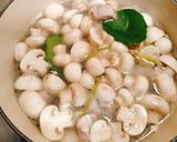 A picture of step 4 of Thai Spicy and Sour Pork Rib Soup.
