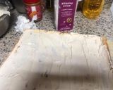 A picture of step 7 of Lotus biscoff strawberry Swiss roll cake.