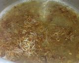 A picture of step 2 of Anday choly ka salan.