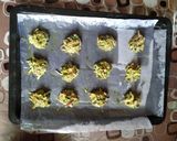 A picture of step 4 of Punjabi kadhi with baked pakoras.