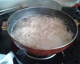 A picture of step 3 of Garlic noodles.