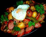 A picture of step 9 of Mike's Sizzling Sausage Egg & Potato Breakfast Skillets.