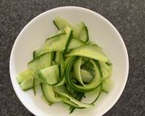 A picture of step 3 of Ribbon pickled cucumbers.