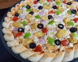 A picture of step 2 of Petal Shape Cheesy Pizza 🍕🍕.