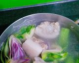 Hình bước làm 4 của món Hoa Atiso Hầm Đuôi Heo