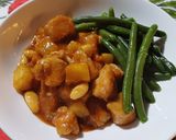 Foto del passaggio 4 della ricetta Pollo in agrodolce con ananas e mandorle 🍍