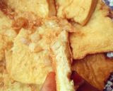 A picture of step 3 of Fried bread with egg.