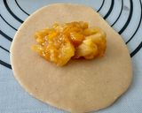 A picture of step 5 of Mango Pineapple Empanada.