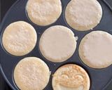 A picture of step 3 of Emoji coconut Pancake.
