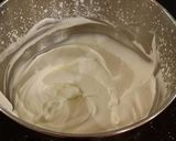 A picture of step 13 of Vanilla / Peanut Butter Ice Cream Cake with a Crispy Crust and Whipped Cream Topping With Creamy Crispy Chicolate Bark.
