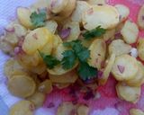 A picture of step 4 of Lyonnaise potatoes.