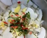 A picture of step 3 of Spicy Pickled Radish.