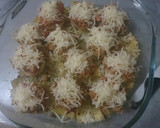 Foto del paso 6 de la receta: Champiñones rellenos en cama de patatas con tomillo y orégano