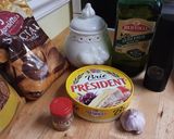 A picture of step 1 of Savory Garlic and Herb Baked Brie.