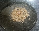 A picture of step 2 of Red Rice with Corn.