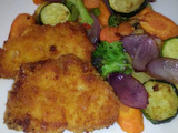 Sütőben sült rántott hús, vegyes, grillezett zöldségkörettel