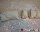 A picture of step 4 of Bouyiourdi in a dough bowl alla Conna.