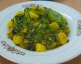 A picture of step 10 of Malabar Spenich with potatoes,A Classic Bengali Dish.