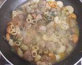 A picture of step 4 of Meatball soup with pasta and herbs.